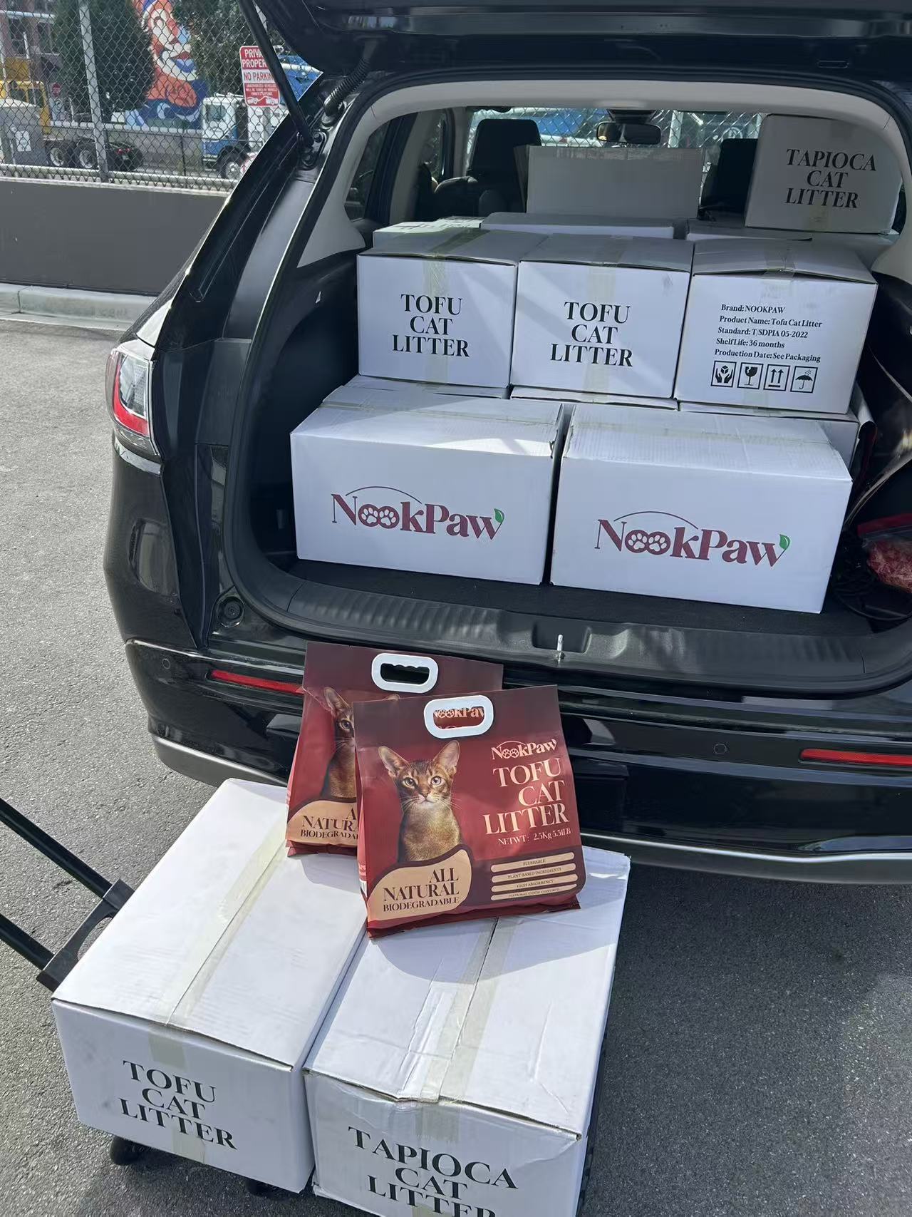 Delivery vehicle loaded with NookPaw cartons for local store runs